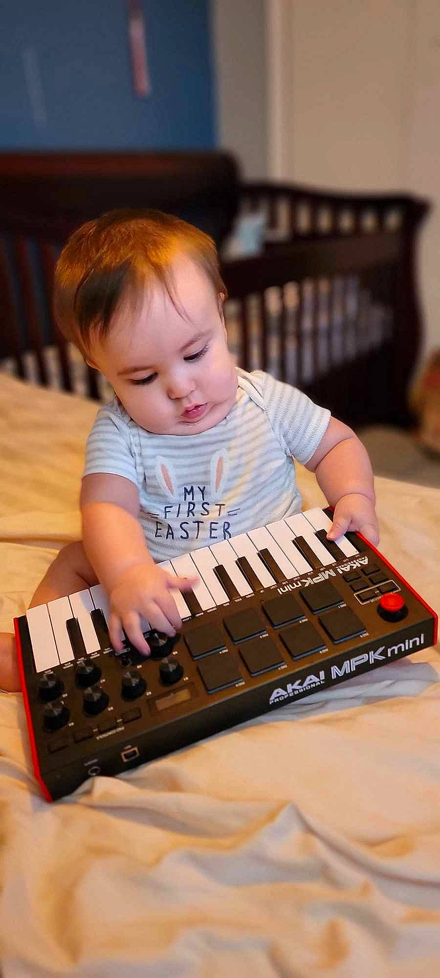 Ellis is registered to the contest to win money with this photo: baby, chair, child, electric_piano, electronic_instrument, electronic_musical_instrument, hardwood, keyboard, keyboard_player, music, musical_instrument, musical_instrument_accessory, musician, nail, organist, person, piano, sitting, toddler, varnish