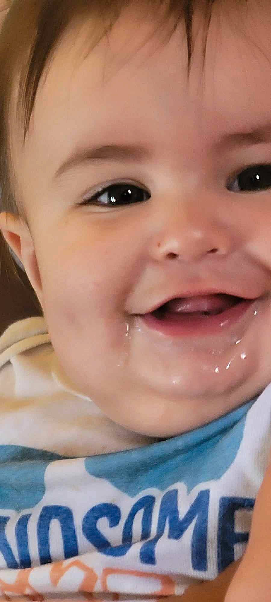 Ellis is registered to the contest to win money with this photo: baby_toddler_clothing, cheek, chin, ear, eyebrow, eyelash, facial_expression, hairstyle, happy, human_body, iris, joy, lip, mouth, neck, nose, organ, person, skin, sleeve