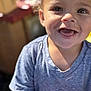 Adonis is registered to the contest to win money with this photo: toddler, child, smiling, happy, curly_hair, blue_shirt, toy, basket, outdoor, sunlight, portrait, face, eyes, mouth_open, cute, playful, young_child, close_up, daylight, casual_clothing