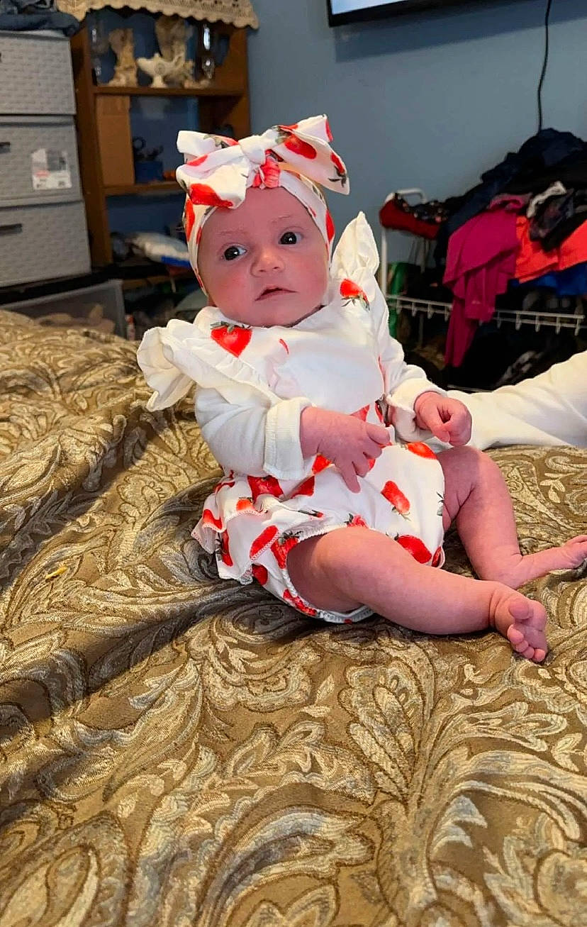 Layken joined the competition — help win amazing prizes! baby, baby_toddler_clothing, cabinetry, carmine, chest_of_drawers, child, comfort, costume_hat, drawer, event, flooring, foot, hat, headwear, holiday, human_leg, lap, person, room, sitting