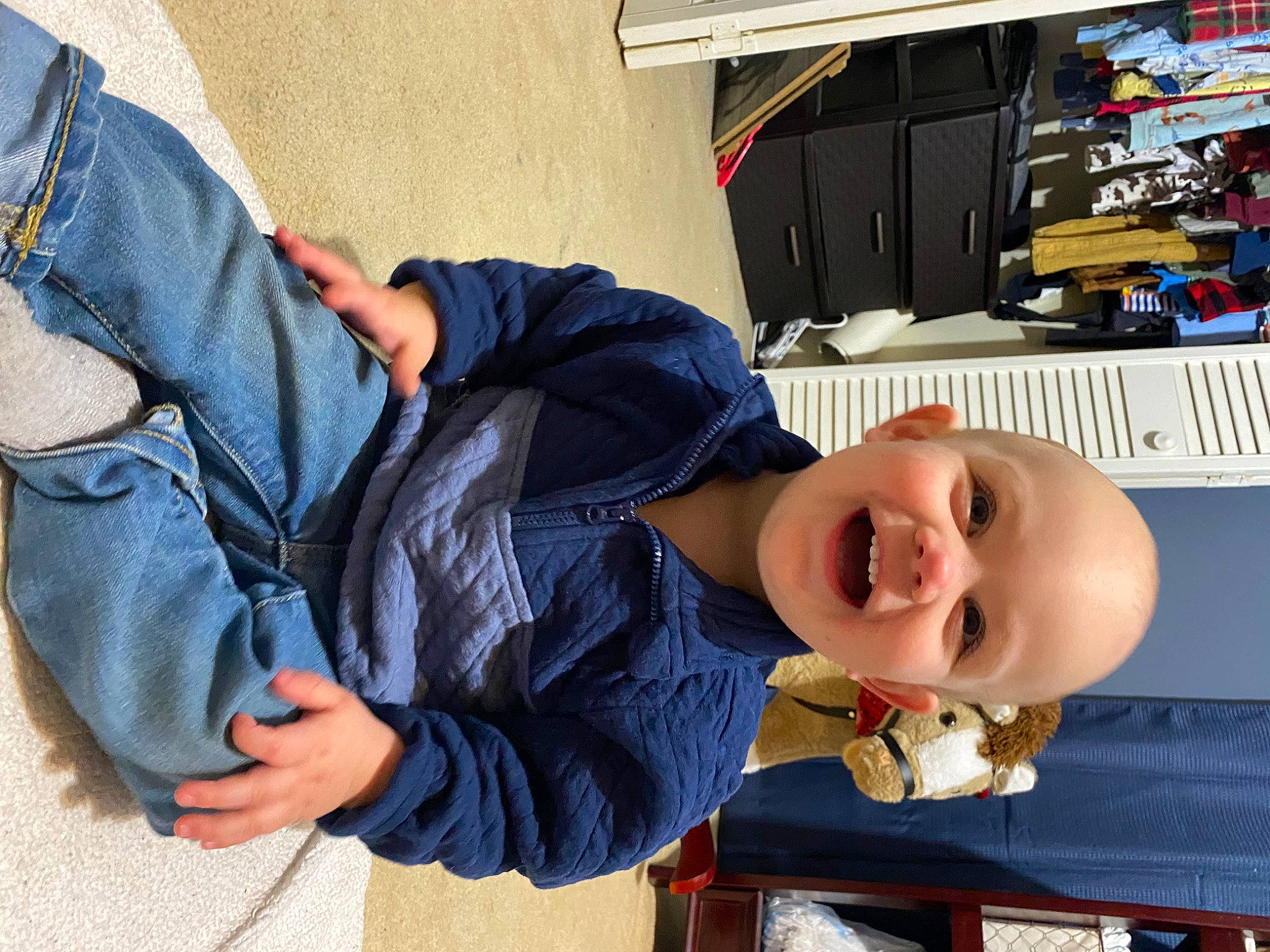Layton joined the competition — help win amazing prizes! baby, child, comfort, denim, eyewear, fun, gesture, happy, joy, person, sitting, smile, toddler, travel, vacation
