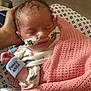 Belle joined the competition — help win amazing prizes! baby, bed, blanket, care, clothing, cute, face, hand, healthcare, hospital, infant, medical_tape, nasal_tube, newborn, person, pink_blanket, rest, sleeping, tender, wristband