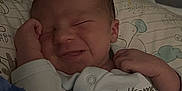Steven Olivier is registered to the contest to win money with this photo: newborn, baby, infant, blanket, onesie, sleeping, smiling, pillow, bed, cozy, cute, child, resting, soft, indoor, portrait, peaceful, clothing, person, sleep