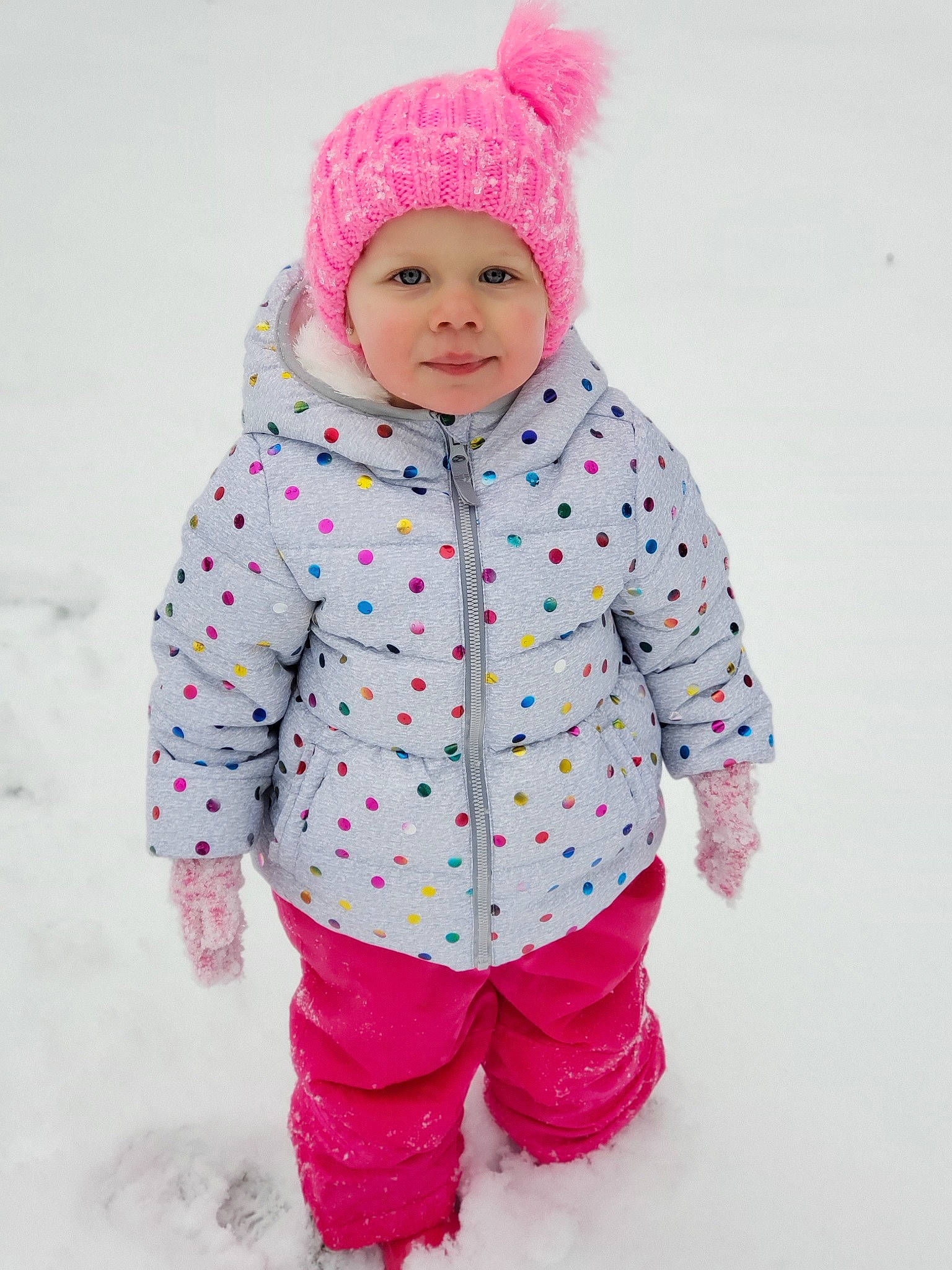 Kyla joined the competition — help win amazing prizes! baby, baby_toddler_clothing, blue, child, clothing, design, fur, headgear, headwear, hood, jacket, outerwear, pattern, person, pink, playing_in_the_snow, product, sleeve, snow, toddler