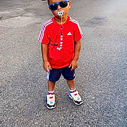 Djulyan a rejoint le concours — aidez-le/la à gagner de superbes lots ! toddler, child, boy, street, sunglasses, pacifier, red_shirt, shorts, sneakers, standing, outdoor, urban, sidewalk, casual, confident, daytime, fashion, accessory, young_child, cool