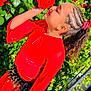 Julianna a rejoint le concours — aidez-le/la à gagner de superbes lots ! child, girl, red_dress, roses, flowers, greenery, braided_hair, smiling, outdoor, sunlight, face_paint, nature, plant, leaf, garden, bracelet, side_profile, happy, young, spring