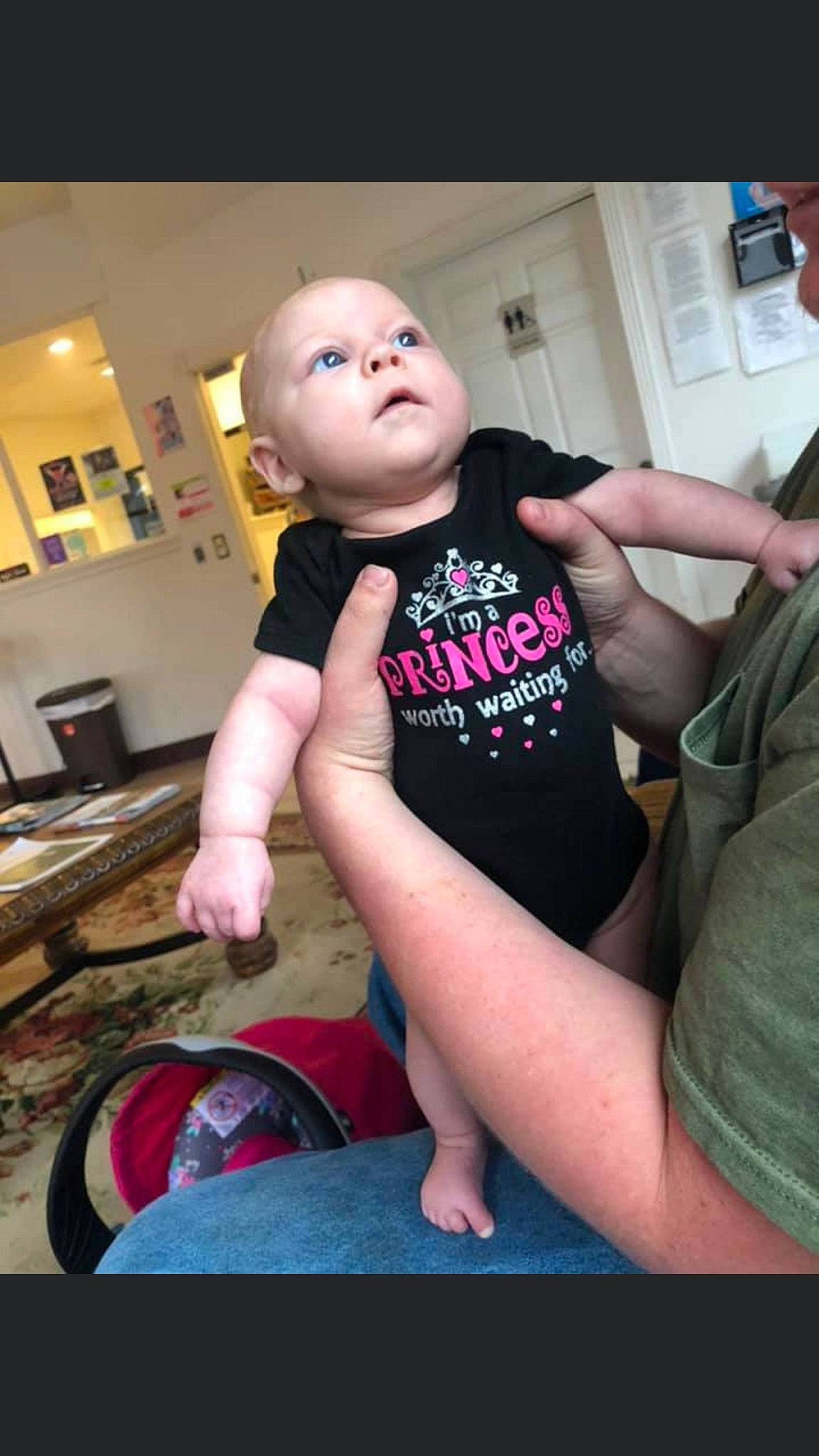 Madi is registered to the contest to win money with this photo: arm, cheek, child, finger, hand, joint, leg, person, shoulder, thigh, thumb, toddler