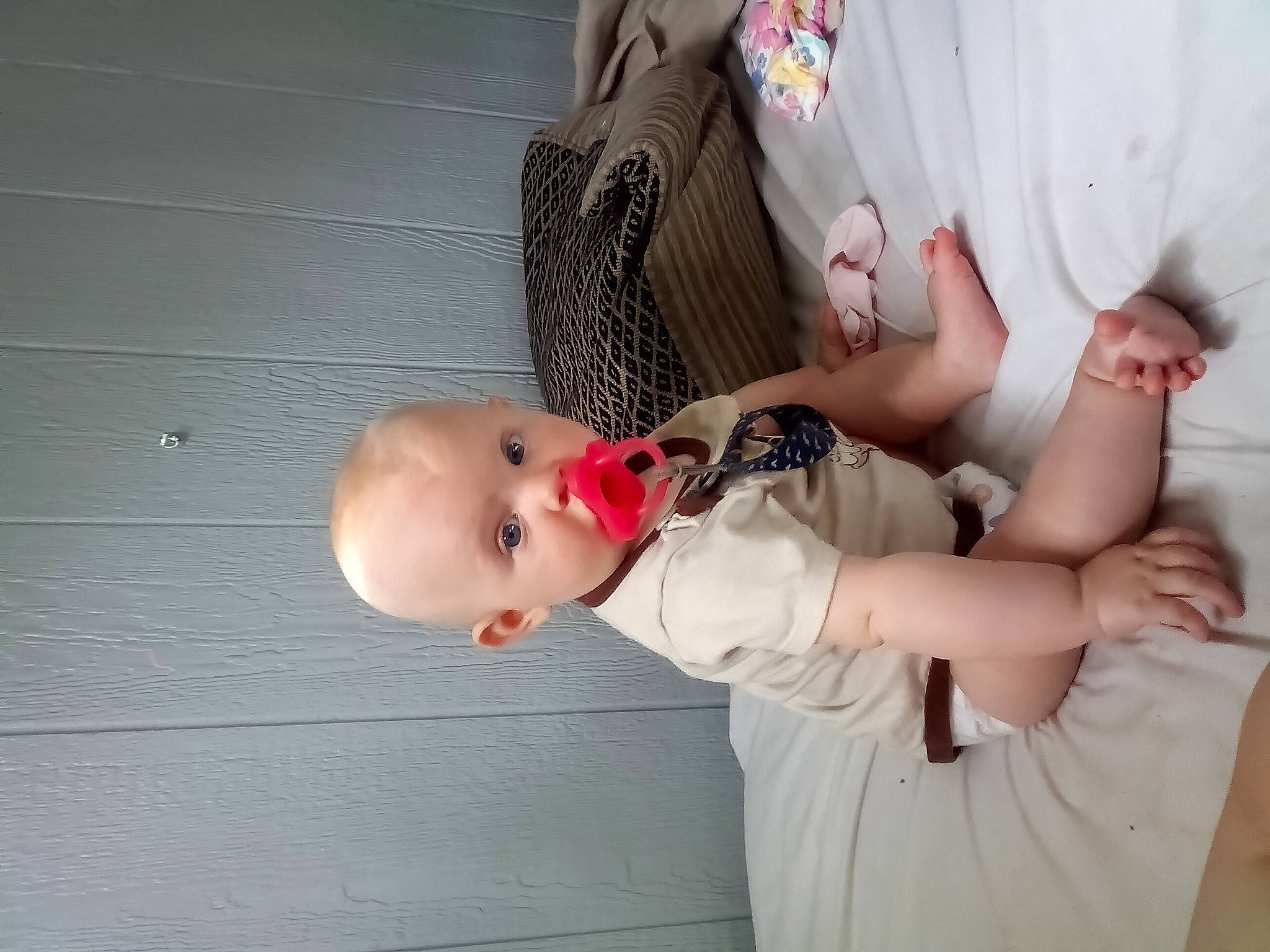 Luna is registered to the contest to win money with this photo: abdomen, arm, baby, baby_products, baby_toddler_clothing, child, comfort, elbow, finger, foot, gesture, hand, human_body, human_leg, leg, nail, pattern, person, skin, sleeve