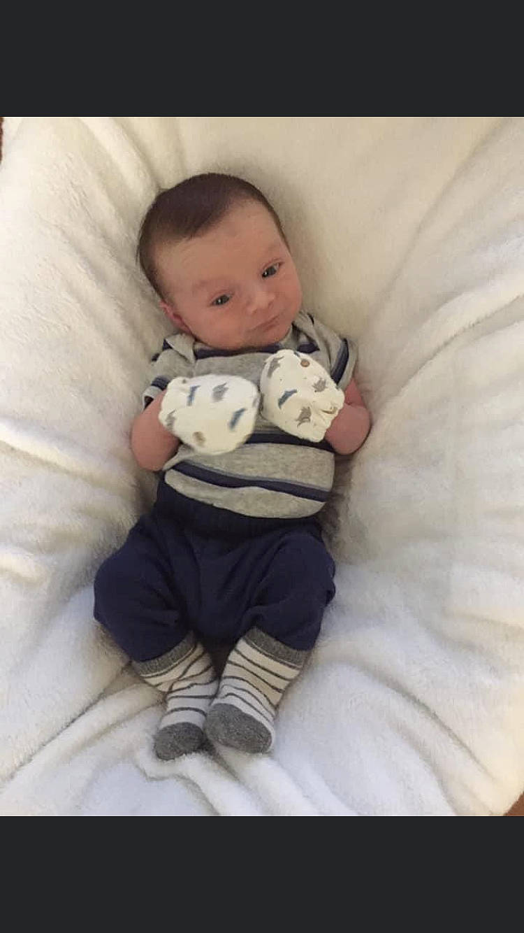 Jeremiah joined the competition — help win amazing prizes! baby, baby_sleeping, baby_toddler_clothing, bedtime, cheek, child, comfort, flash_photography, fur, happy, head, linens, pattern, person, sitting, sleeve, t_shirt, textile, throw_pillow, toddler