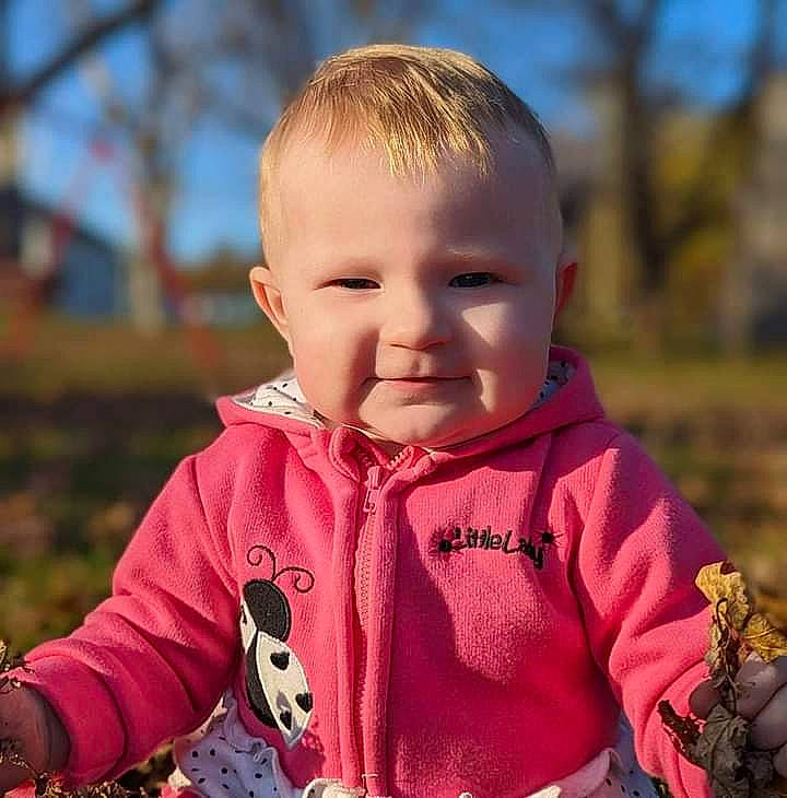 Avery joined the competition — help win amazing prizes! baby, baby_toddler_clothing, blond, cheek, child, cool, eye, facial_expression, fun, grass, happy, joy, nose, outerwear, people_in_nature, person, sitting, skin, sky, sleeve