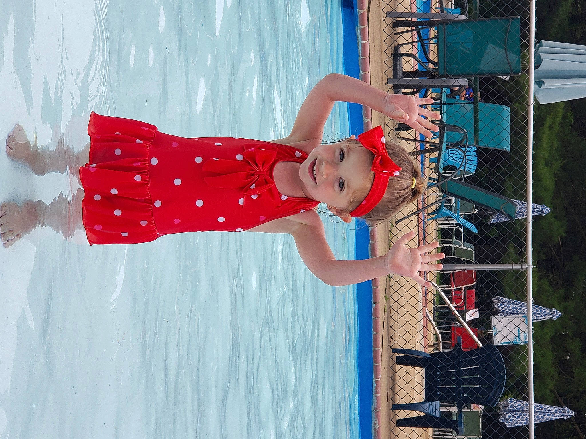 Ava joined the competition — help win amazing prizes! blue, dress, fun, headwear, joy, leisure, performance, person, red, textile, water