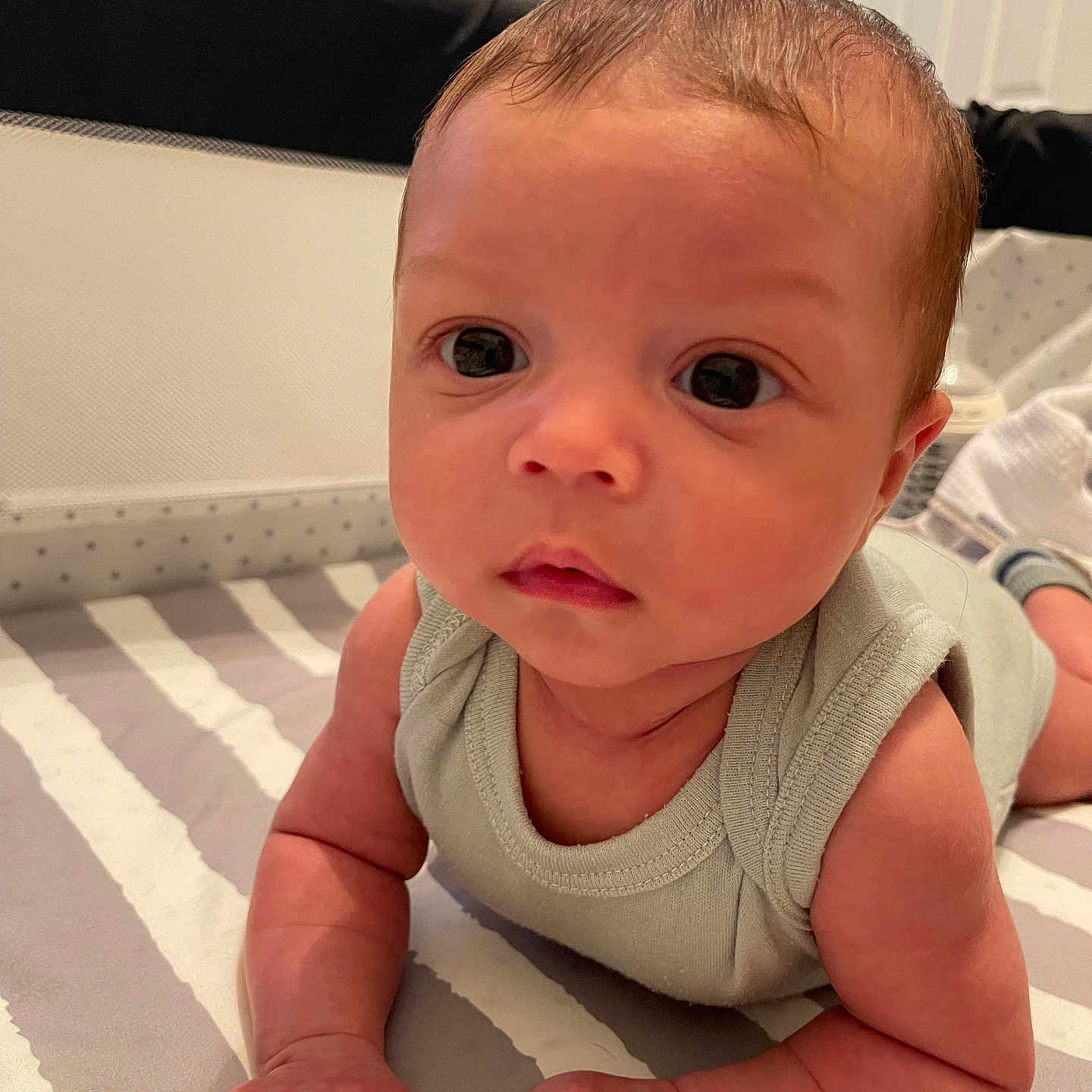 Codrey is registered to the contest to win money with this photo: baby, babycrawling, bed, bedroom, bodypart, crawling, crib, face, finger, furniture, hand, head, indoors, infantbed, newborn, person, photography, portrait, room, sitting