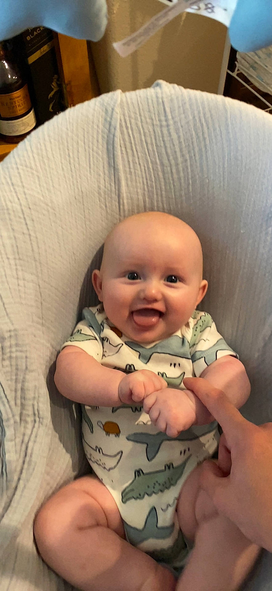 Zeke is registered to the contest to win money with this photo: baby, baby_toddler_clothing, cheek, child, chin, comfort, eye, face, happy, head, headgear, iris, joy, mouth, nose, person, sitting, skin, sleeve, smile
