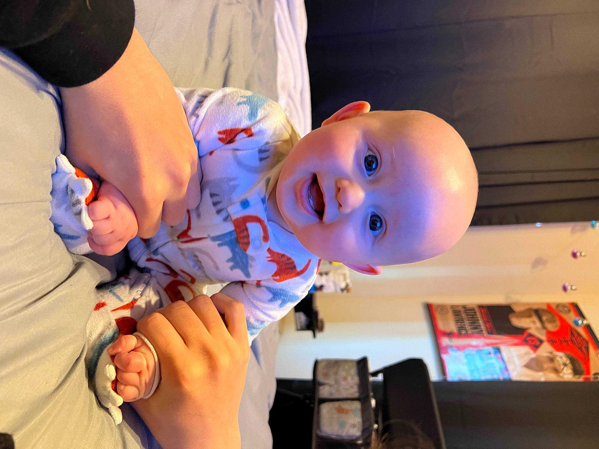 Zeke joined the competition — help win amazing prizes! baby, child, clothing, electric_blue, event, finger, fun, gesture, hand, hat, mouth, nail, orange, person, play, room, smile, t_shirt, thumb, toddler