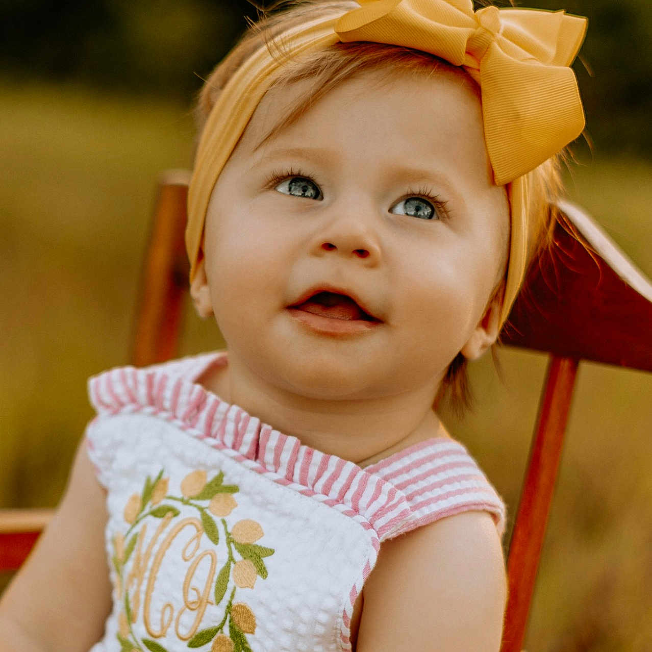 Magnolia joined the competition — help win amazing prizes! accessories, baby, chair, clothing, dress, face, flower, formalwear, furniture, happy, hat, head, headband, person, photography, portrait, sitting, smile, t_shirt, wood