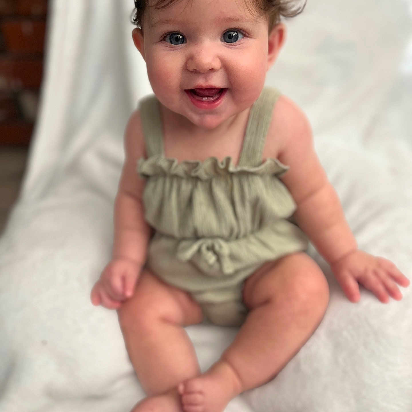Karter-Jrue is registered to the contest to win money with this photo: baby, blue_eyes, child, chubby, close_up, cute, fingers, hair, happy, indoor, infant, person, portrait, romper, sitting, skin, smiling, soft_blanket, toes, young