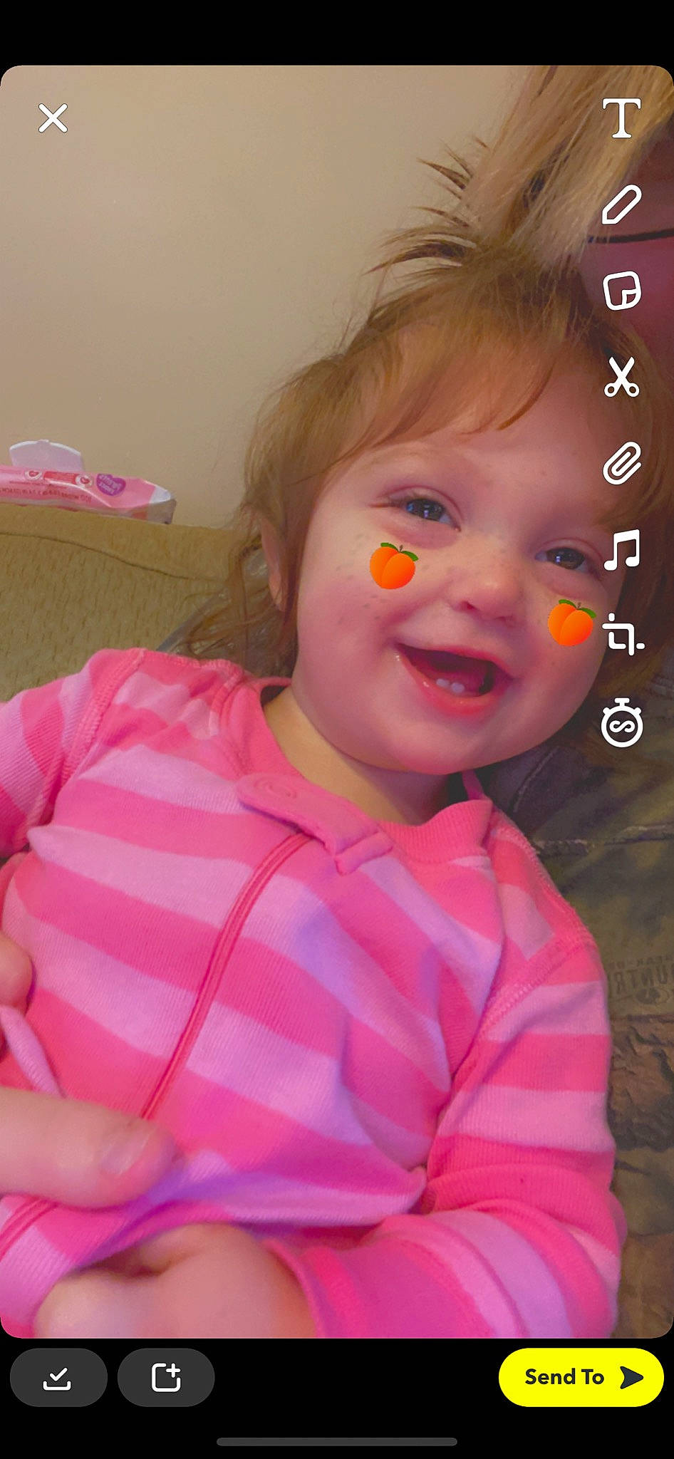 Paisley is registered to the contest to win money with this photo: baby, baby_toddler_clothing, bed, cheek, child, eyebrow, eyelash, facial_expression, iris, joy, linens, lip, person, photo_caption, pink, portrait_photography, skin, toddler, tongue, tooth