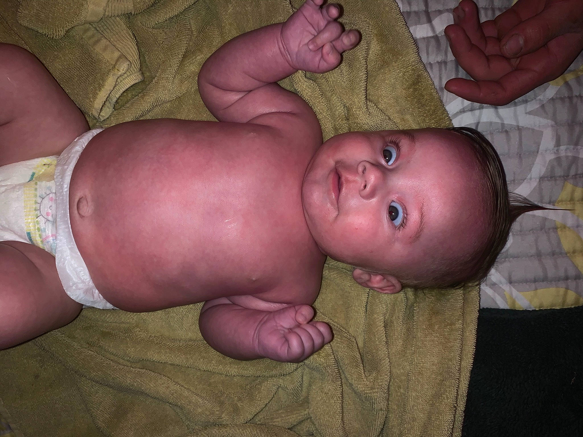 Coalson is registered to the contest to win money with this photo: arm, baby, cheek, chest, child, hand, mouth, muscle, neck, person, skin, stomach, thumb, trunk