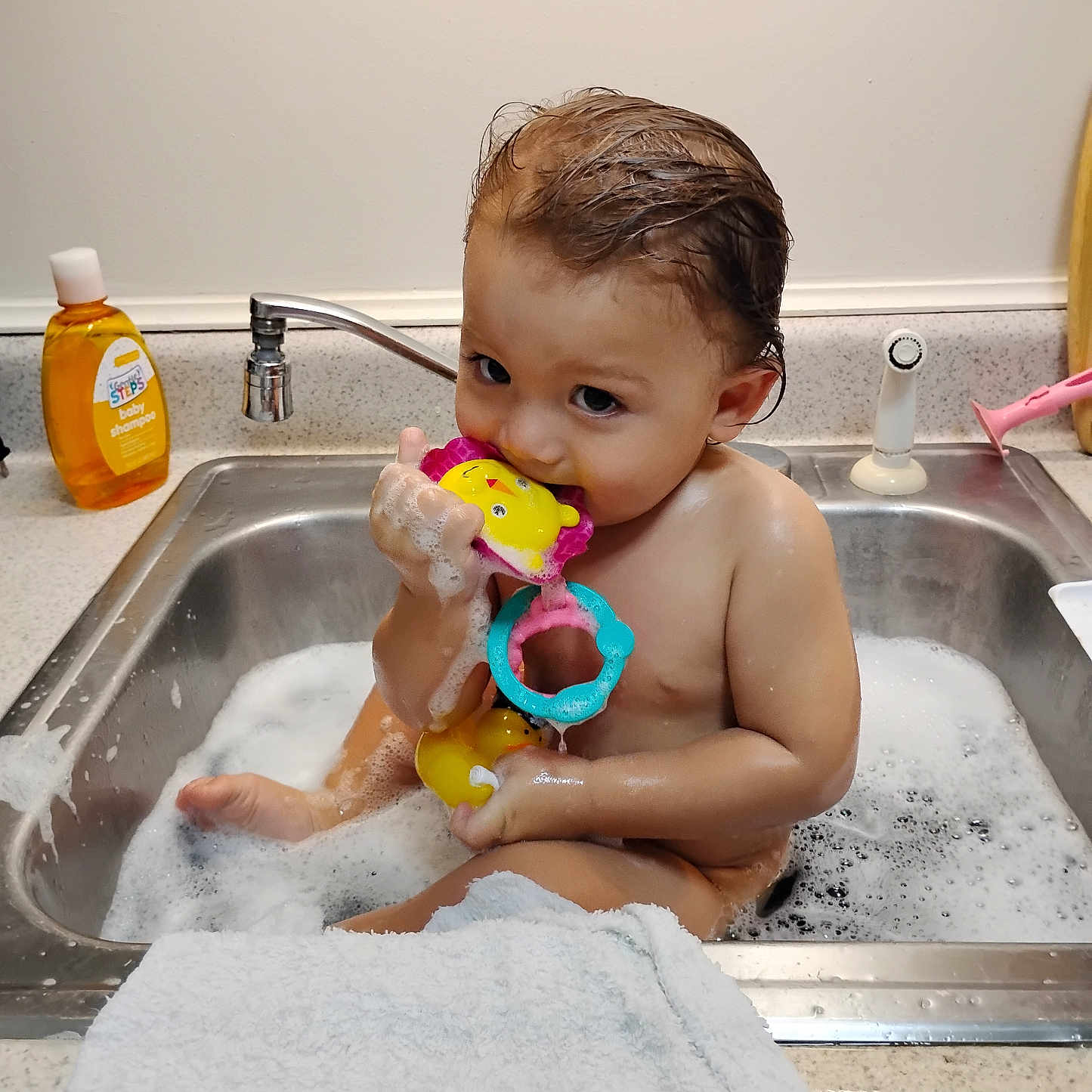 Jasiah joined the competition — help win amazing prizes! baby, child, toddler, bath, bathtub, sink, bubbles, bubble_bath, bath_toy, toy, shampoo, towel, kitchen, faucet, wet_hair, sitting, 裸?, smiling, indoor, portrait
