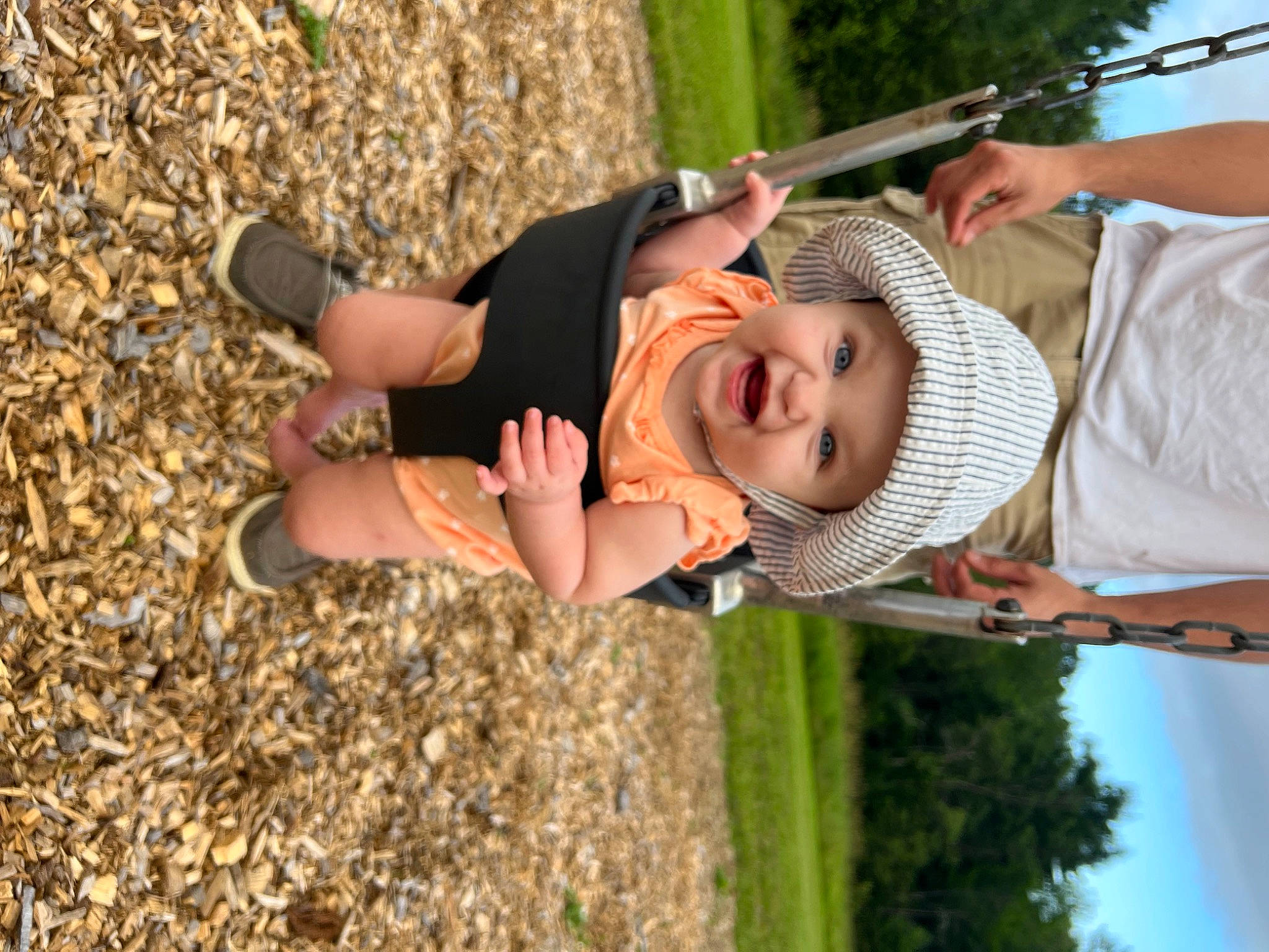 Calli joined the competition — help win amazing prizes! baby, child, event, fun, grass, happy, hat, headwear, leaf, leisure, people_in_nature, person, plant, play, recreation, sky, smile, soil, sun_hat, toddler