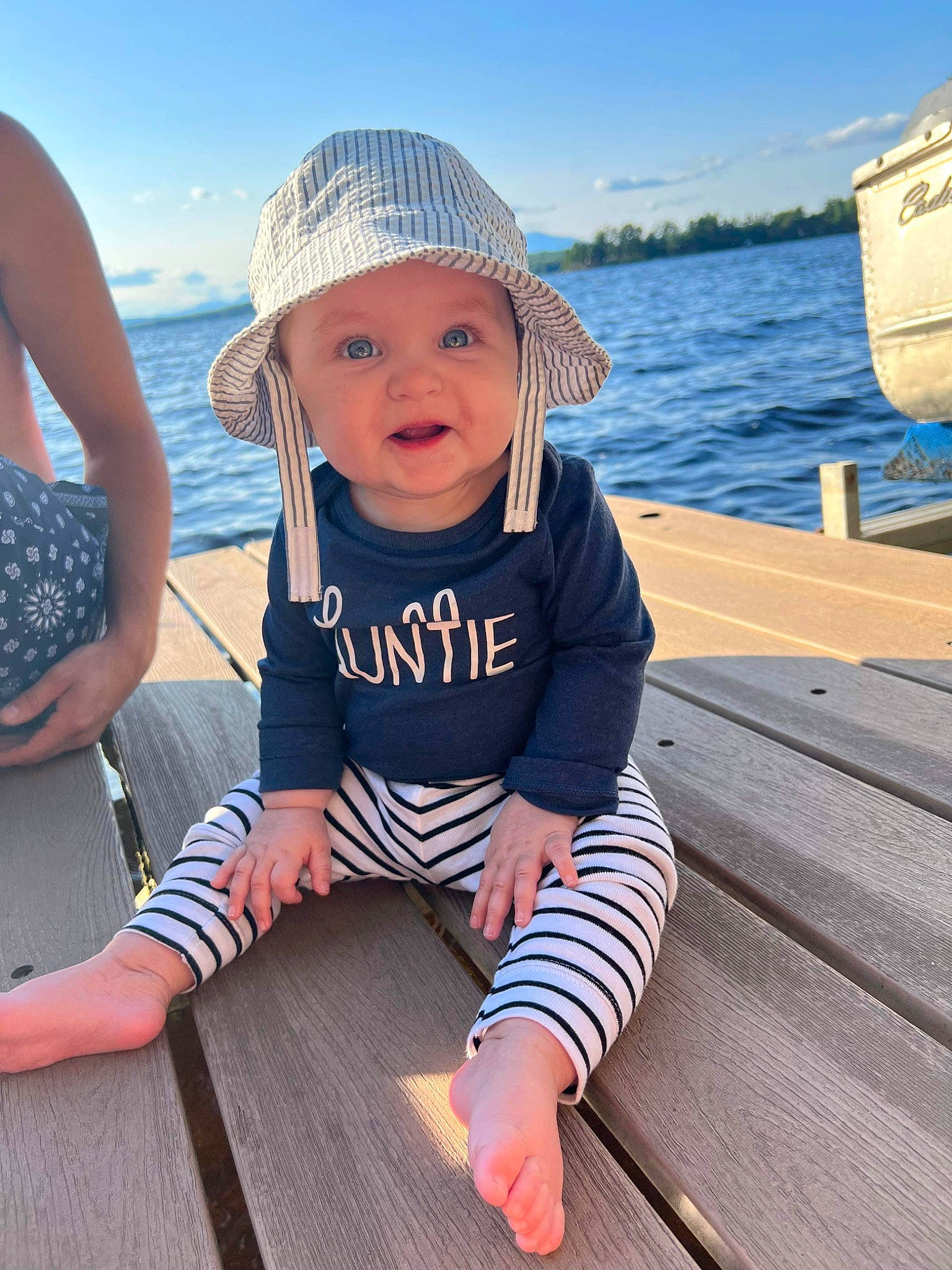 Calli joined the competition — help win amazing prizes! baby, baby_toddler_clothing, cap, cloud, electric_blue, foot, fun, happy, hat, headwear, lake, leisure, person, sky, sleeve, smile, sun_hat, t_shirt, toddler, travel