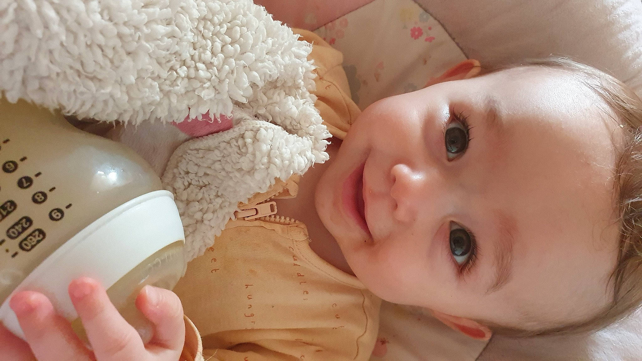 Ester Rose Gatrell is registered to the contest to win money with this photo: arm, baby, baby_toddler_clothing, cheek, eyelash, finger, gesture, hand, happy, headgear, joy, lip, mouth, nail, nose, organ, person, product, skin, smile