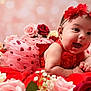 baby, infant, smiling, red_dress, headband, flowers, roses, pink, red, cream, blanket, tutu, happy, cute, portrait, lying_down, soft_focus, bokeh, celebration, festive