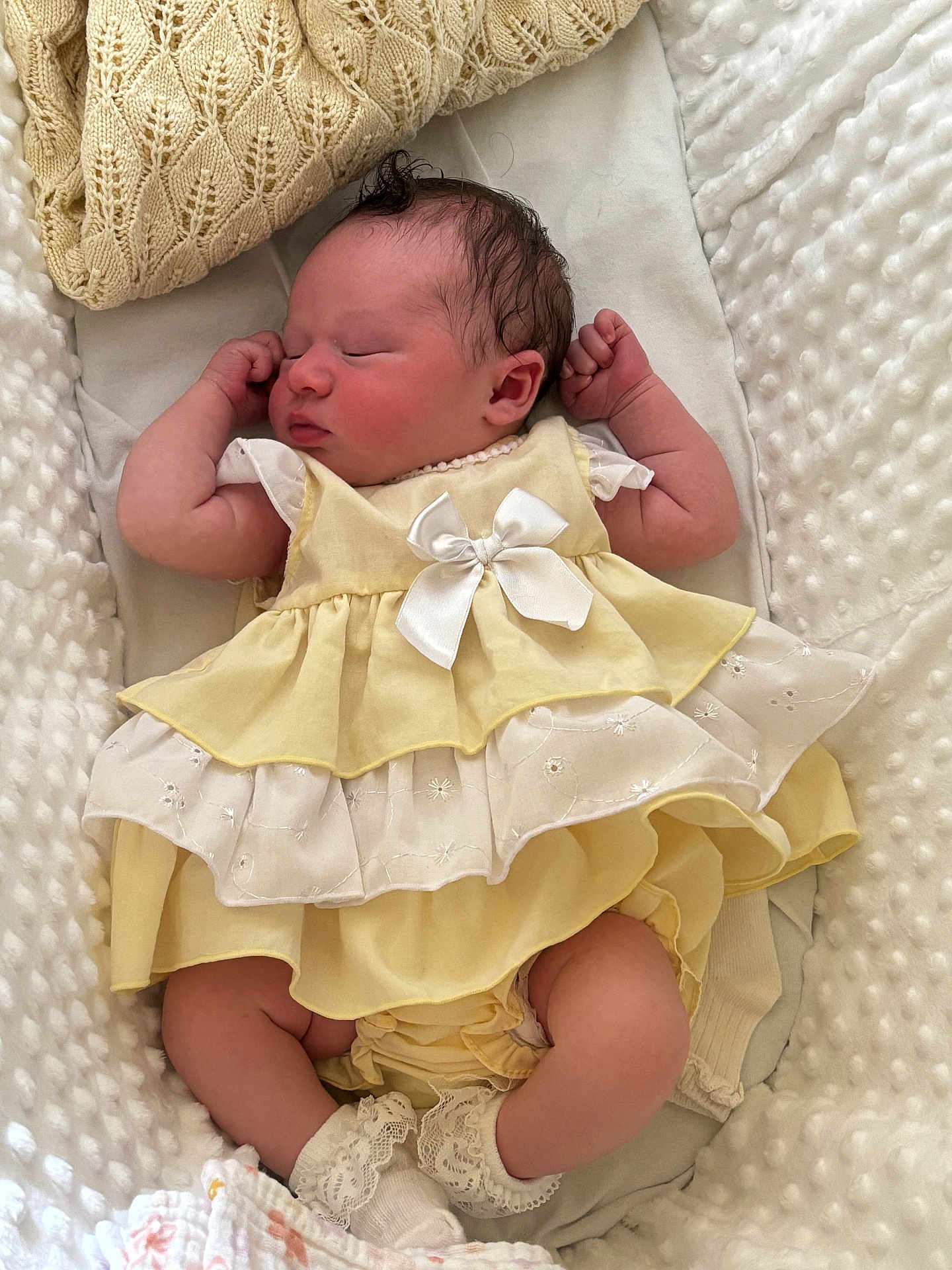 Maybelle joined the competition — help win amazing prizes! newborn, baby, sleeping, dress, yellow_dress, white_bow, blanket, soft_texture, infant, cute, cozy, resting, indoors, portrait, child, small_arms, peaceful, lace_socks, fabric, toddler