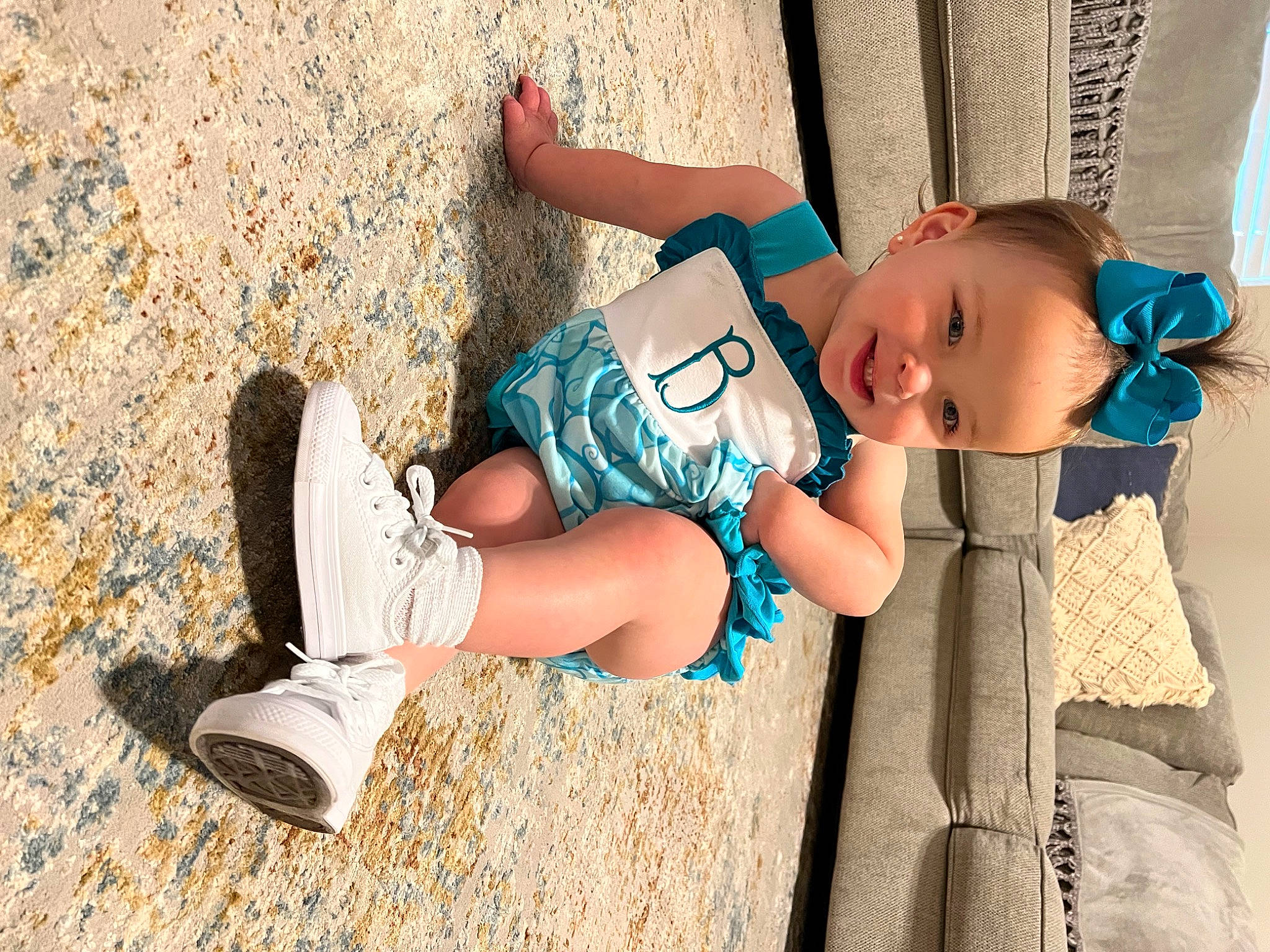 Briggs is registered to the contest to win money with this photo: baby, baby_toddler_clothing, child, cool, electric_blue, face, glasses, grass, happy, hat, human_body, human_leg, joint, knee, leg, people_in_nature, person, street_fashion, sun_hat, thigh