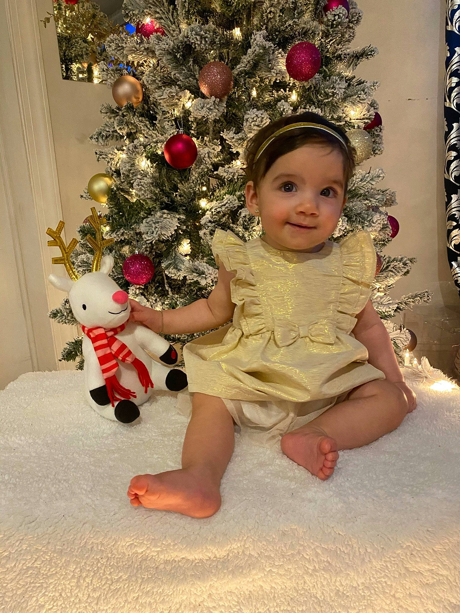 Rylie joined the competition — help win amazing prizes! baby, baby_toddler_clothing, cheek, child, christmas, christmas_decoration, christmas_eve, christmas_lights, christmas_ornament, christmas_tree, hair_accessory, holiday, holiday_ornament, human, interior_design, joy, ornament, person, pink, toddler