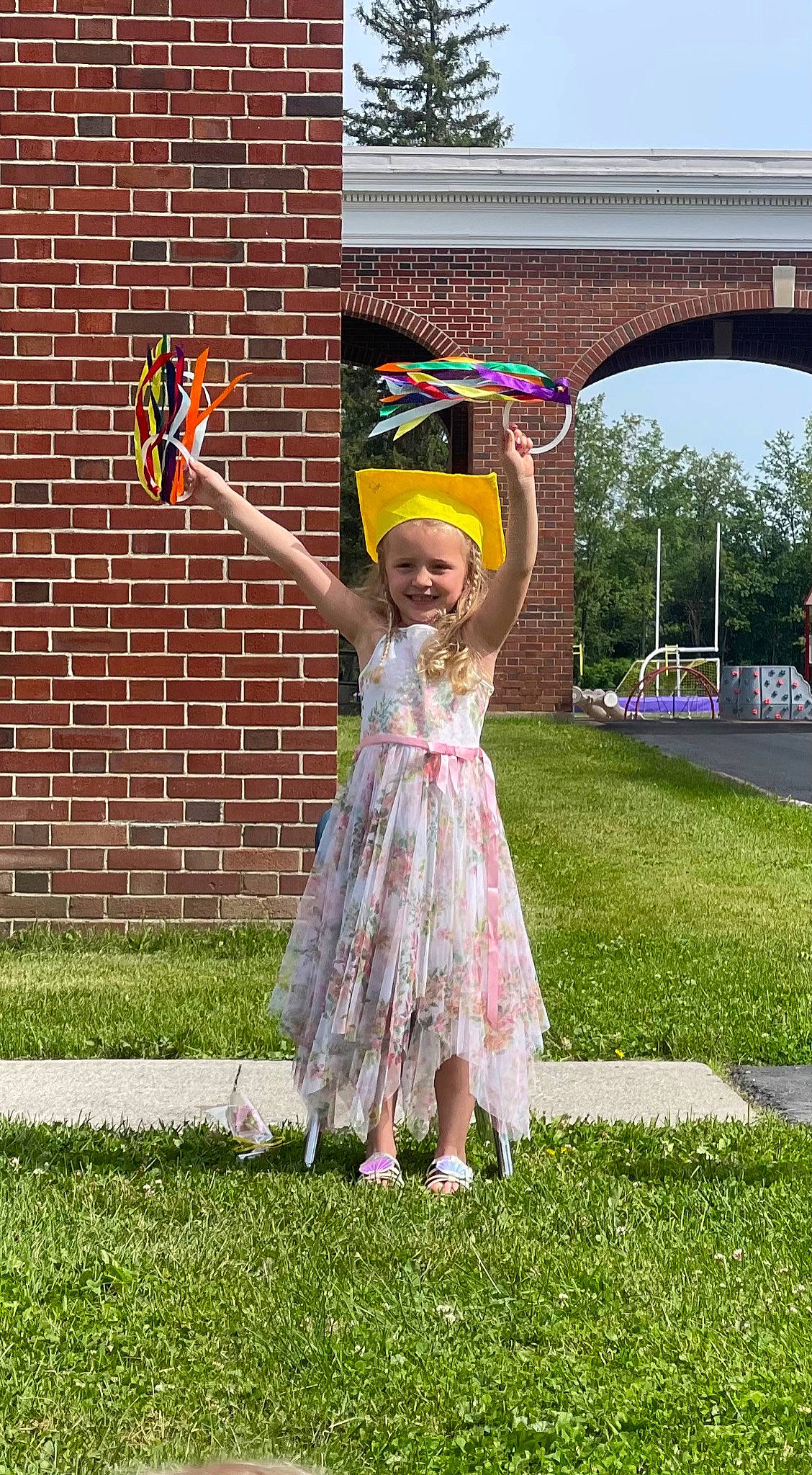 Jade is registered to the contest to win money with this photo: automotive_wheel_system, event, fun, grass, grass_family, grassland, happy, hat, joy, lawn, leisure, party_supply, people_in_nature, person, pink, plant, pole, recreation, sky, smile