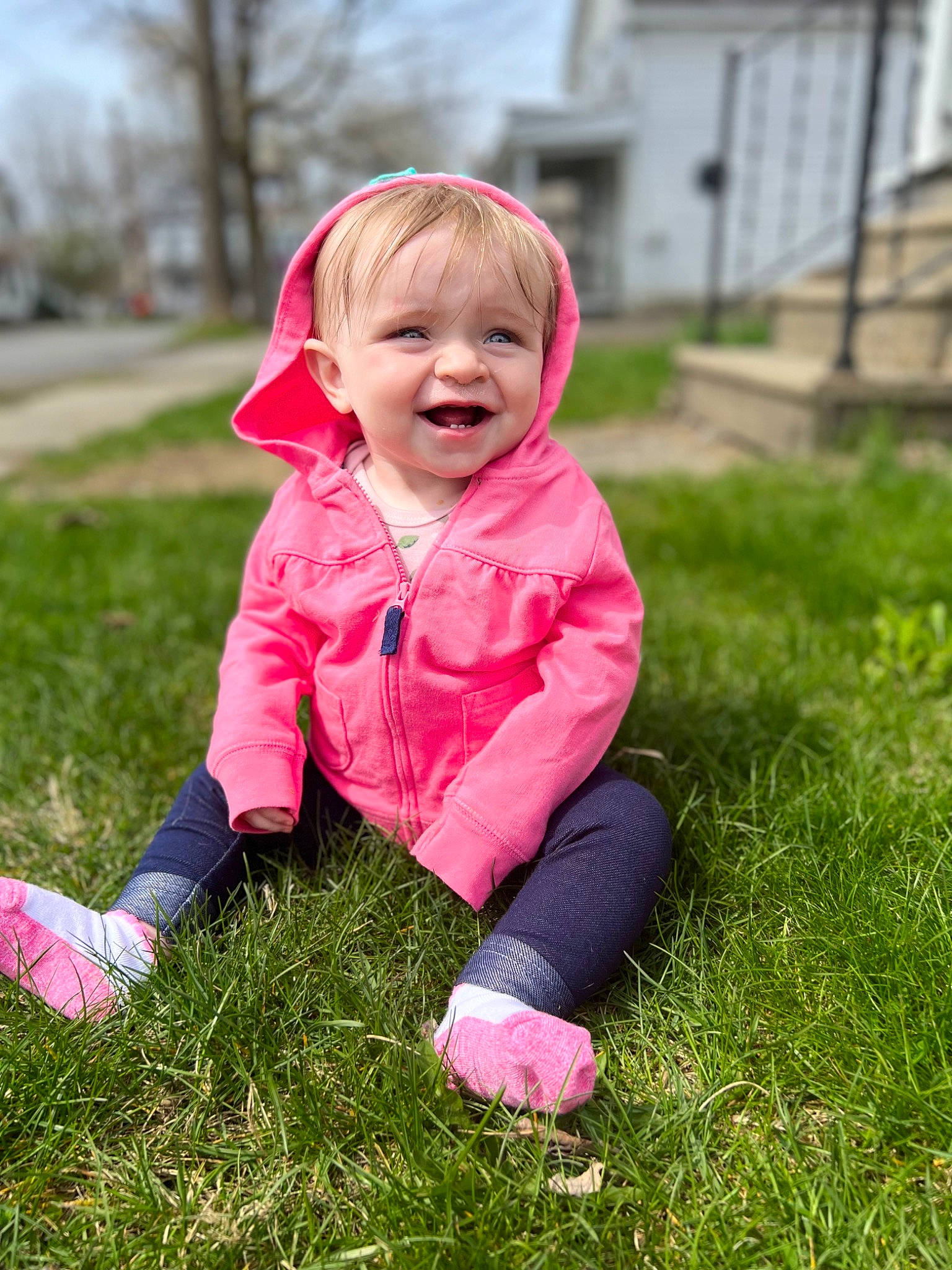 Josi is registered to the contest to win money with this photo: baby, baby_toddler_clothing, blond, face, fun, grass, grassland, happy, jacket, lawn, meadow, nose, outerwear, people_in_nature, person, plant, skin, sky, smile, toddler