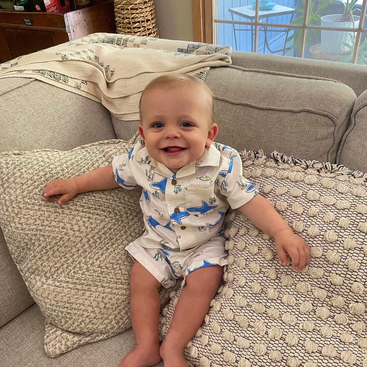 Sawyer joined the competition — help win amazing prizes! accessories, architecture, baby, bag, building, couch, cushion, face, furniture, happy, head, homedecor, indoors, linen, livingroom, person, photography, portrait, room, sitting