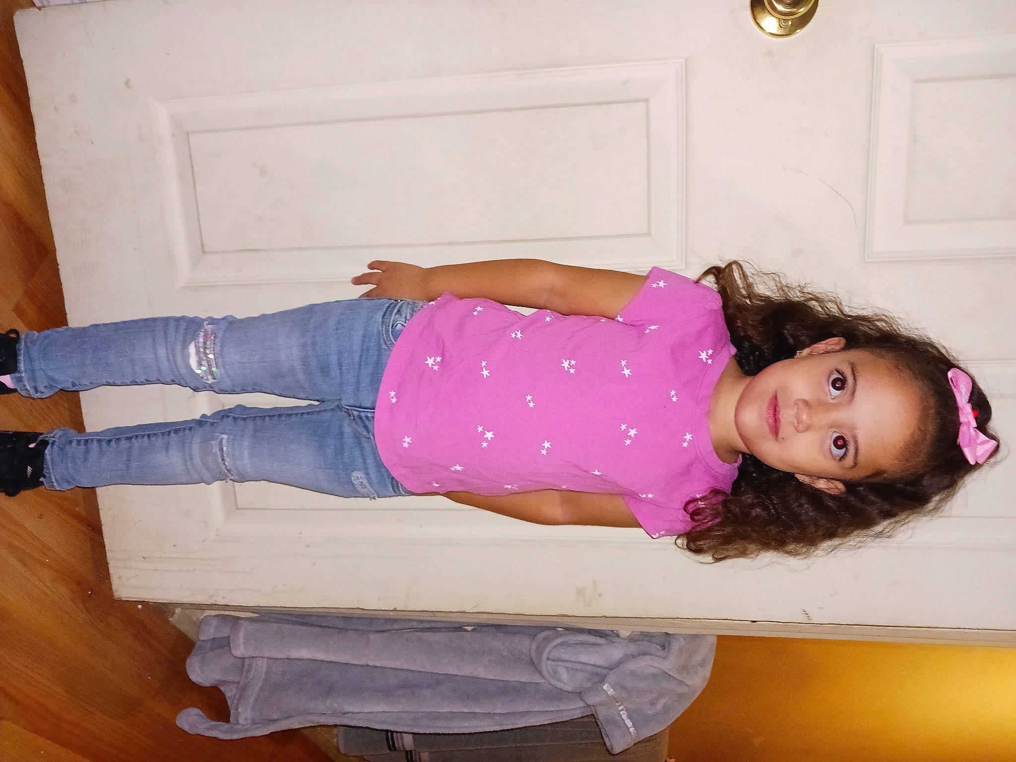 Sierra is registered to the contest to win money with this photo: abdomen, comfort, eyelash, flooring, hardwood, human_leg, joint, knee, magenta, pattern, person, picture_frame, pink, purple, shoulder, sitting, sleeve, thigh, trunk, waist