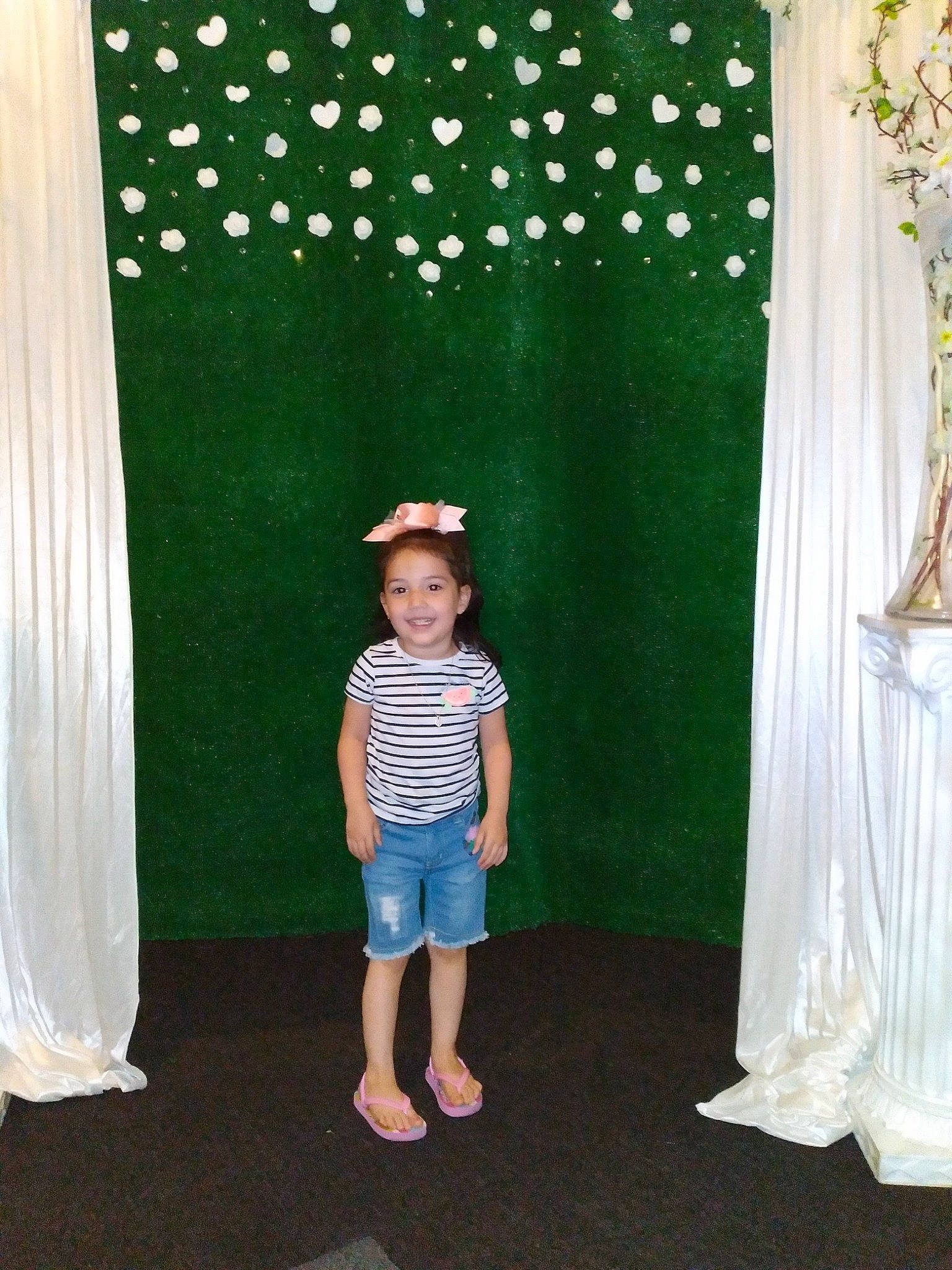 Jayanna joined the competition — help win amazing prizes! aqua, baby_toddler_clothing, child, curtain, event, flooring, fun, joy, leaf, leisure, magenta, pattern, person, pink, plant, sleeve, smile, standing, textile, toddler