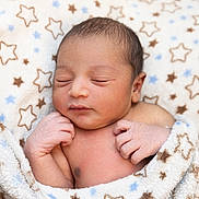 Ruhaan is registered to the contest to win money with this photo: newborn, baby, sleeping, blanket, star_pattern, infant, skin, cute, peaceful, closeup, wrapped, soft, hands, face, resting, child, portrait, cozy, young, adorable