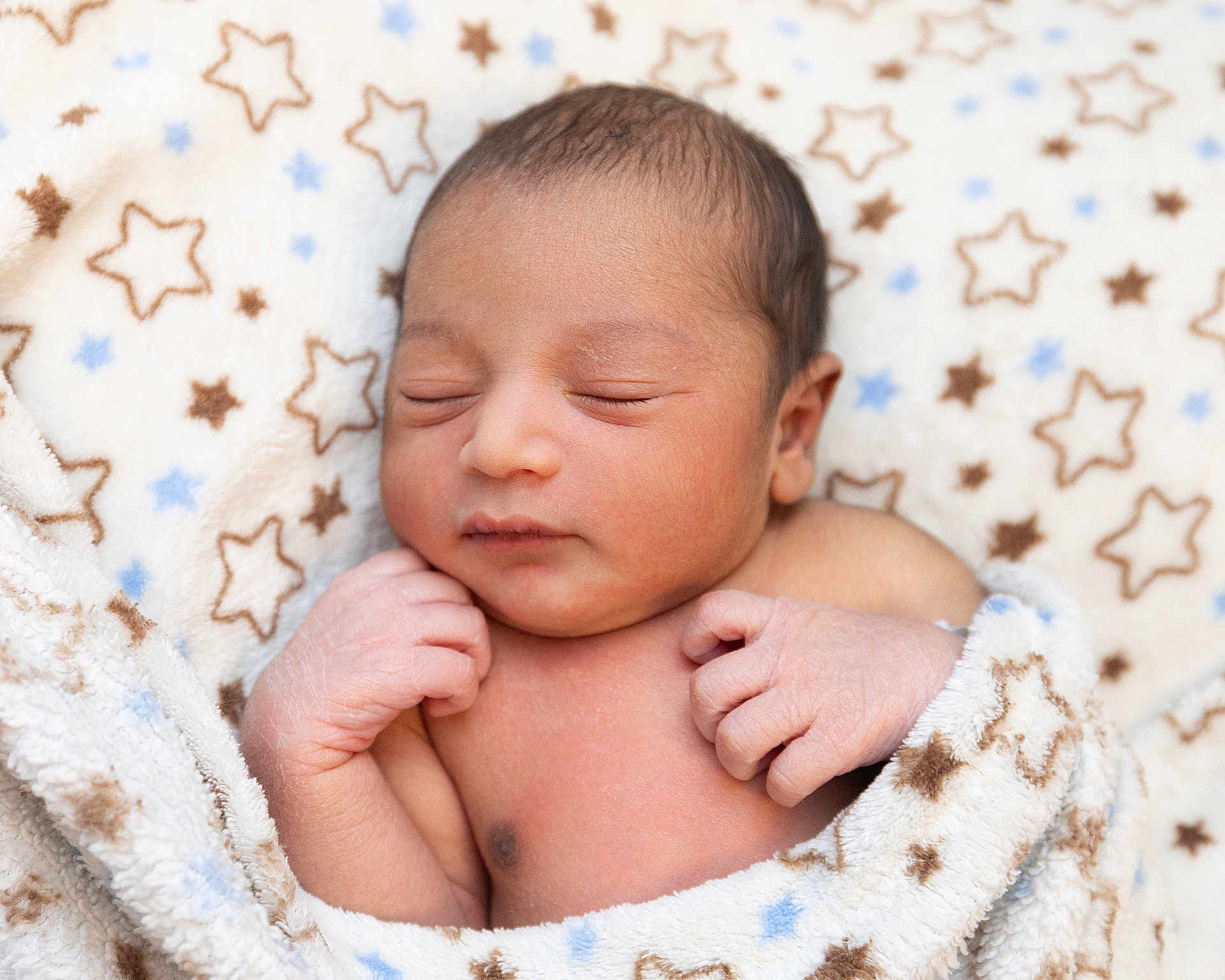 Ruhaan is registered to the contest to win money with this photo: newborn, baby, sleeping, blanket, star_pattern, infant, skin, cute, peaceful, closeup, wrapped, soft, hands, face, resting, child, portrait, cozy, young, adorable