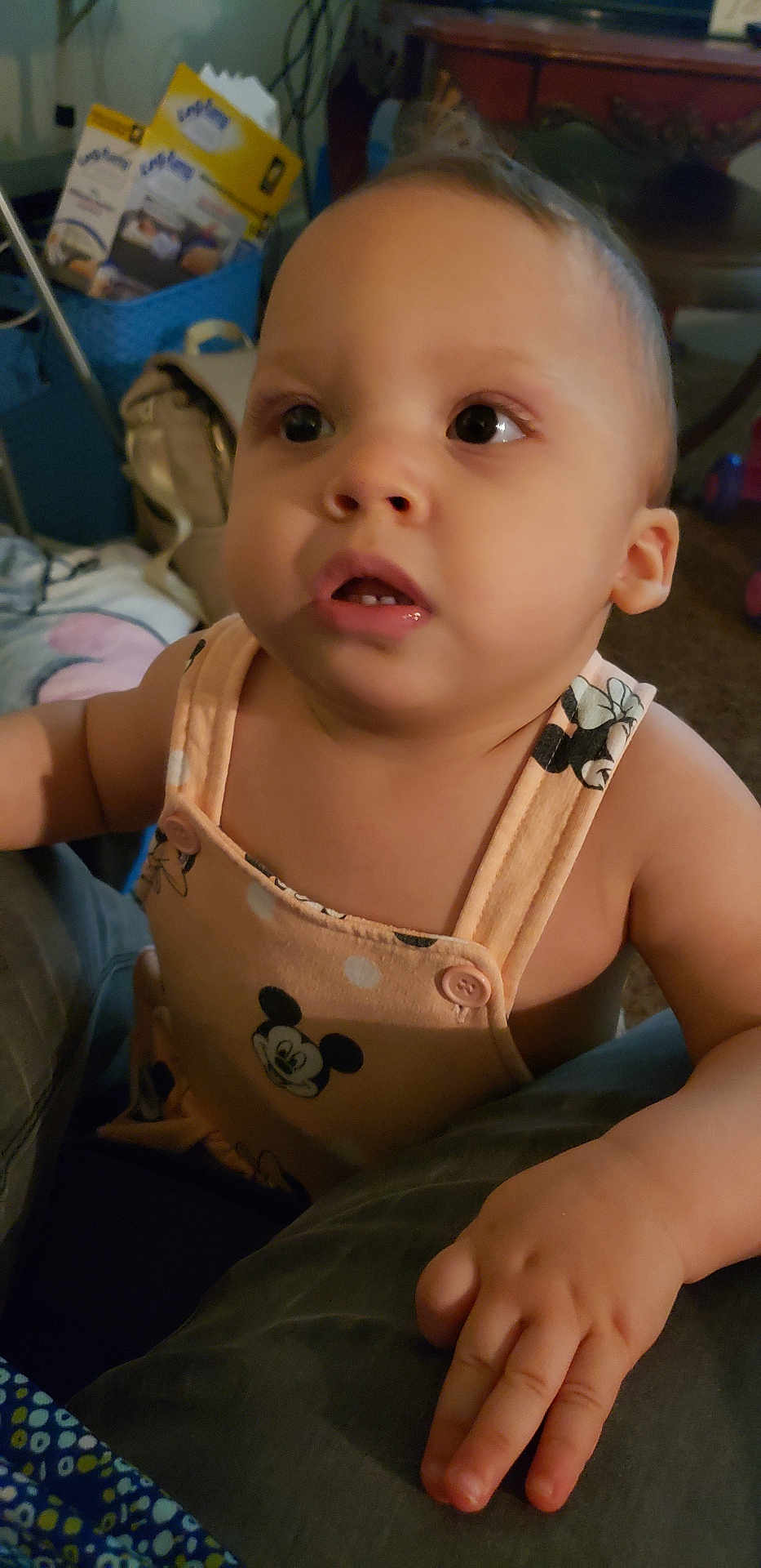 Kylie joined the competition — help win amazing prizes! toddler, child, face, hand, clothing, mickey_mouse, indoor, person, curious, baby, skin, young_child, expression, sleeveless, furniture, home, carpet, toy, couch, light