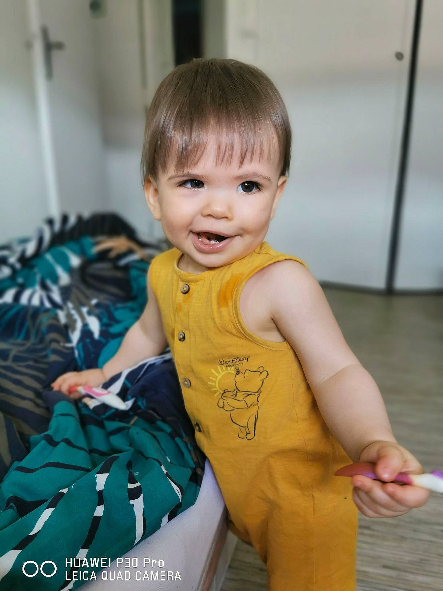 Curtis participe au concours pour gagner de l'argent avec cette photo : baby, baby_toddler_clothing, child, electric_blue, event, fashion_design, flooring, fun, happy, human_leg, pattern, person, room, shoulder, sitting, sleeve, smile, sportswear, standing, t_shirt