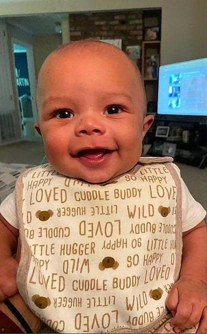 Nash joined the competition — help win amazing prizes! baby, baby_laughing, baby_toddler_clothing, cheek, child, chin, computer_monitor, door, font, forehead, fun, handwriting, happy, joy, person, sleeve, smile, t_shirt, television, thumb