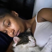 Homie joined the competition — help win amazing prizes! arm, bed, black_and_white, blanket, calm, cat, close_up, comfort, cozy, face, fur, indoor, intimate, nap, person, quiet, resting, shoulder, sleeping, soft_lighting