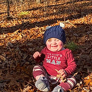 Tobias joined the competition — help win amazing prizes! baby, cap, clothing, face, hat, head, land, leaf, nature, outdoors, pants, person, photography, plant, portrait, soil, tree, vegetation, wilderness, woodland