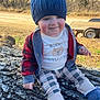 Tobias joined the competition — help win amazing prizes! alloywheel, baby, cap, clothing, coat, face, hat, head, jacket, jeans, pants, person, photography, plant, portrait, rock, sitting, soil, tree, vegetation