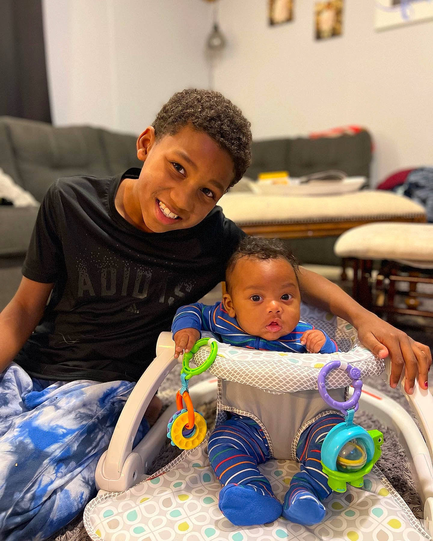 Jakaj joined the competition — help win amazing prizes! baby, baby_products, baby_toddler_clothing, child, comfort, couch, event, facial_expression, fun, happy, human, joy, leisure, people, person, play, product, room, sharing, sitting