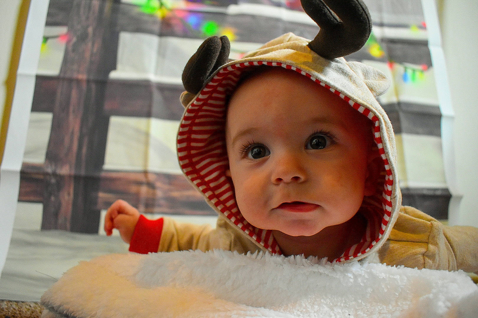 Kenny is registered to the contest to win money with this photo: baby, cheek, child, ear, face, fun, head, headgear, person, skin, smile, toddler