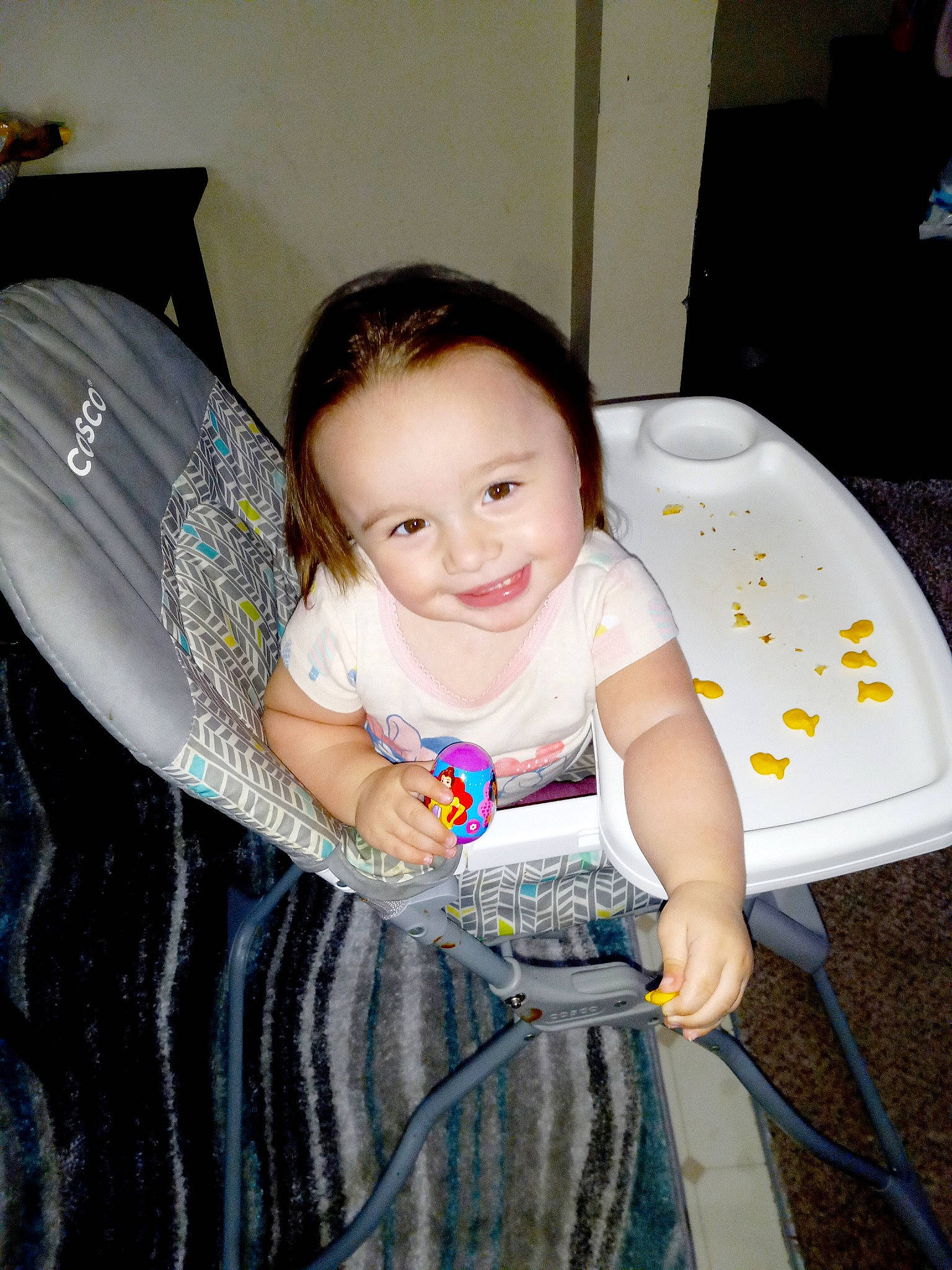 Kynslee is registered to the contest to win money with this photo: baby, baby_products, baby_toddler_clothing, chair, child, facial_expression, flash_photography, flooring, fun, hairstyle, happy, iris, joy, leisure, pattern, person, product, sitting, skin, smile