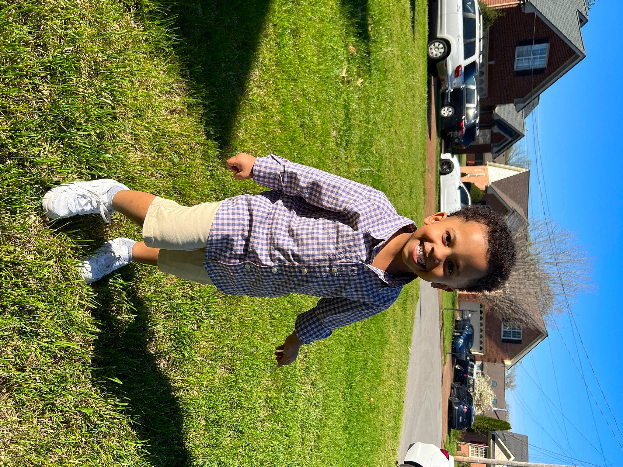 Kashton is registered to the contest to win money with this photo: artificial_turf, child, fun, grass, green, happy, joy, lawn, leisure, nature, people_in_nature, person, plant, pole, recreation, shrub, sky, smile, summer, toddler