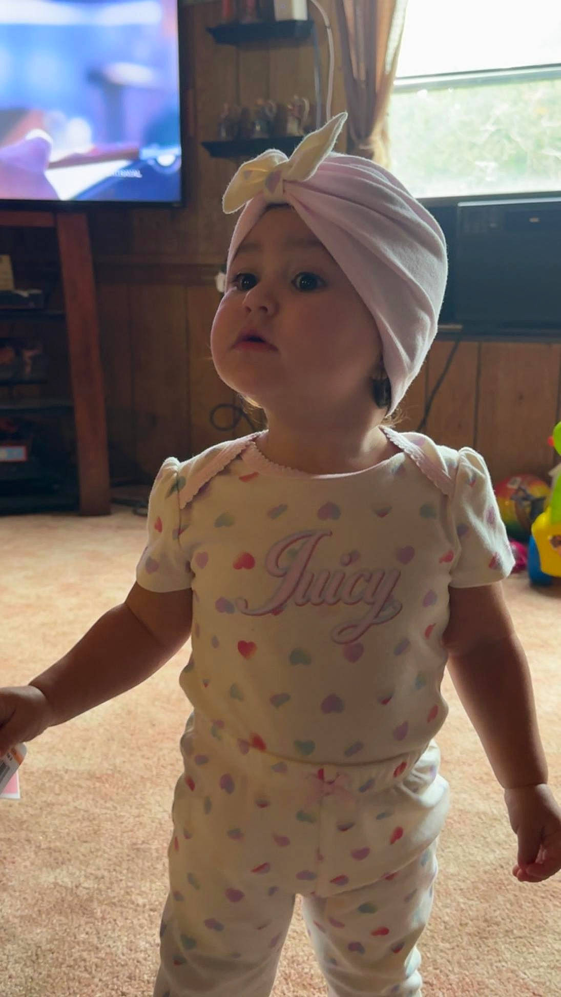 A'Mari joined the competition — help win amazing prizes! baby, baby_toddler_clothing, cap, child, cool, flooring, fun, happy, headwear, led_backlit_lcd_display, nose, pattern, person, skin, sleeve, standing, television, television_set, thumb, toddler