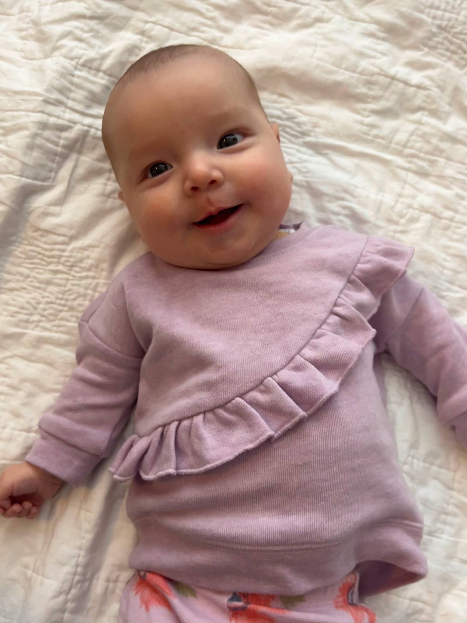 Annalee is registered to the contest to win money with this photo: baby, baby_toddler_clothing, cheek, eye, flooring, happy, head, human_body, iris, lip, mouth, nose, person, pink, product, skin, sleeve, smile, textile, toddler