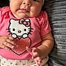 Brianna joined the competition — help win amazing prizes! baby, infant, child, portrait, sitting, pink_clothing, hello_kitty, heart_pattern, headband, cushion, indoor, close_up, face, hands, feet, wide_eyes, cozy, cute, textile, photography